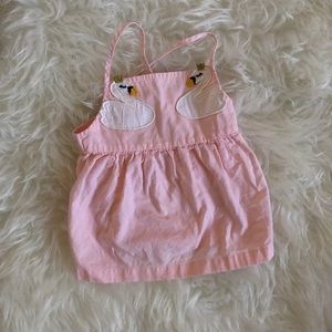 Pink tank top dress with swans